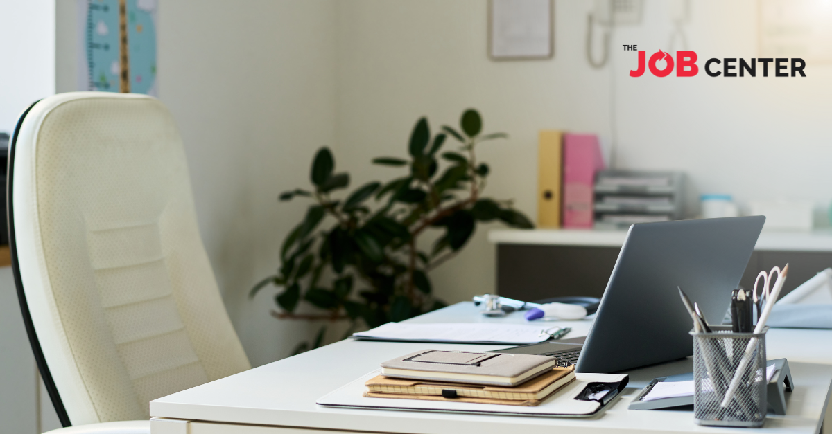 An empty office chair and desk symbolizes temporary workers who leave after the holidays